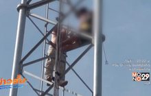 พ่อจับลูกวัย 4 ขวบปีนเสาโทรศัพท์หวังฆ่าตัวตาย