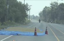 ชาวนายังตากข้าวเปลือกบนถนน แม้เกิดอุบัติเหตุ