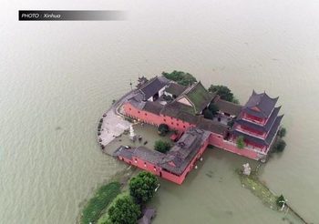 12 เมืองในอันฮุยประกาศ ‘ฉุกเฉินน้ำท่วม’ หลังฝนตกหนักต่อเนื่อง
