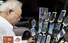 คุณปู่ใช้มือถือเล่นโปเกมอนโกพร้อมกัน 15เครื่อง