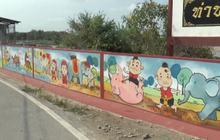 การ์ตูนวิถีไทย บนกำแพงริมเจ้าพระยา จ.อ่างทอง
