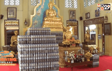 ชาวอ่างทองแห่แก้บนด้วยน้ำอัดลมนับหมื่นขวด