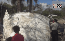 จนท.เตรียมเข้าตรวจสอบชิ้นส่วนเครื่องบิน