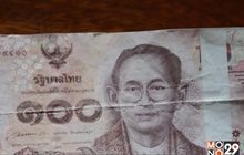 ชาวบ้านตื่นแบงก์ร้อยมีแถบขาว
