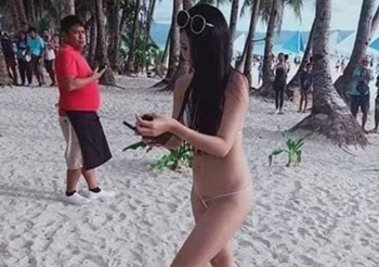 นทท.สาว ถูกจับ เหตุใส่บิกินีตัวจิ๋ว เดินริมหาด