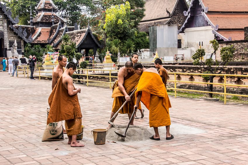 buddhist monks at work