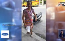 หญิงร้องไห้ขอรถจักรยานยนต์คืน หลังถูกยึดเพราะผิดกฎจราจร